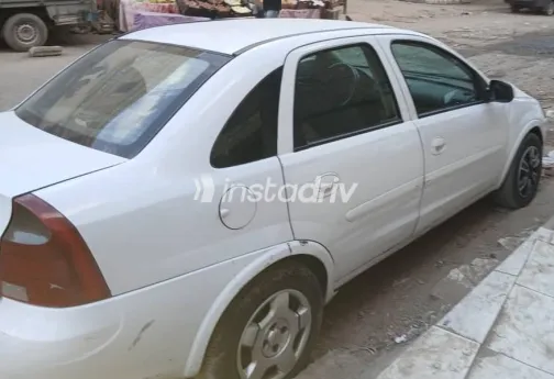 اوبل كورسا 2005 أبيض مستعملة للبيع - 1