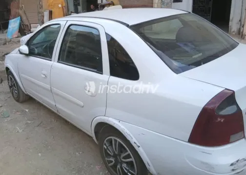 اوبل كورسا 2005 أبيض مستعملة للبيع - 3