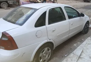 اوبل كورسا 2005 أبيض مستعملة للبيع
