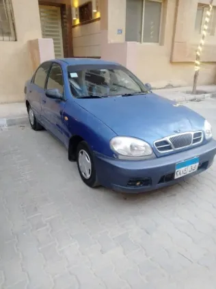 دايو لانوس 2004 أزرق غامق مستعملة للبيع