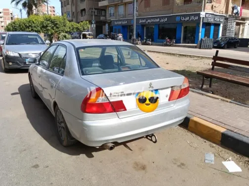ميتسوبيشي لانسر كرستالة 1999 فضي مستعملة للبيع - 1