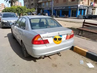 ميتسوبيشي لانسر كرستالة 1999 فضي مستعملة للبيع