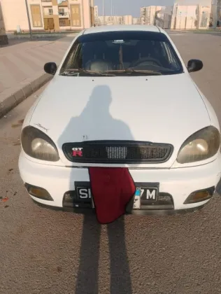 دايو لانوس 2009 أبيض مستعملة للبيع