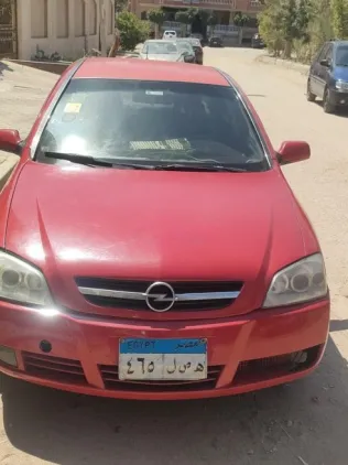 اوبل أسترا 2004 أحمر مستعملة للبيع