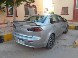 ميتسوبيشي لانسر اى اكس شارك 2017 رمادي مستعملة للبيع