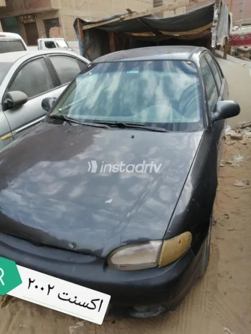 هيونداي اكسنت 2001 أحمر غامق مستعملة للبيع - 8