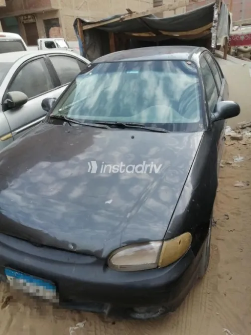 هيونداي اكسنت 2001 أحمر غامق مستعملة للبيع - 9