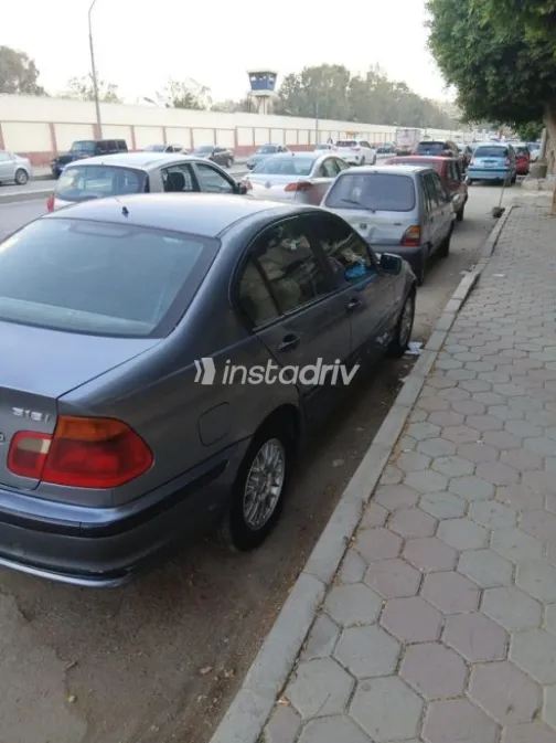 بي ام دبليو 318 1999 رمادي غامق مستعملة للبيع - 2
