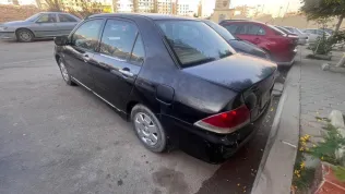 ميتسوبيشي لانسر 2008 أسود مستعملة للبيع