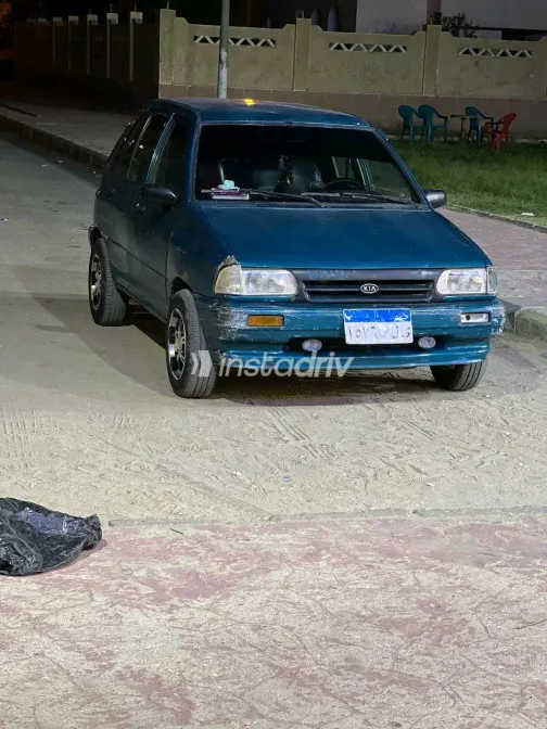 كيا برايد 1999 أخضر مستعملة للبيع - 1