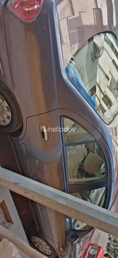 نيسان صنى 2010 أبيض مستعملة للبيع - 10