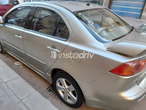 ميتسوبيشي لانسر اى اكس شارك 2008 ذهبي مستعملة للبيع - 3