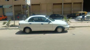 دايو لانوس 1997 أبيض مستعملة للبيع