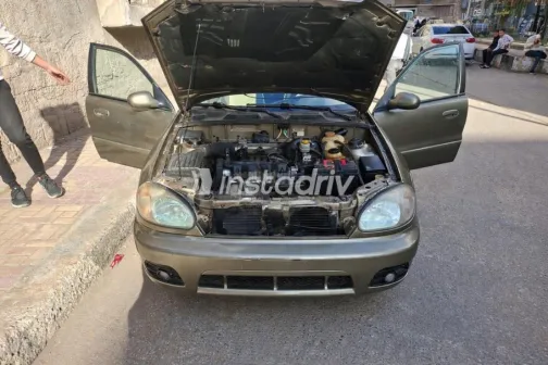 دايو لانوس 2002 ذهبي مستعملة للبيع - 2