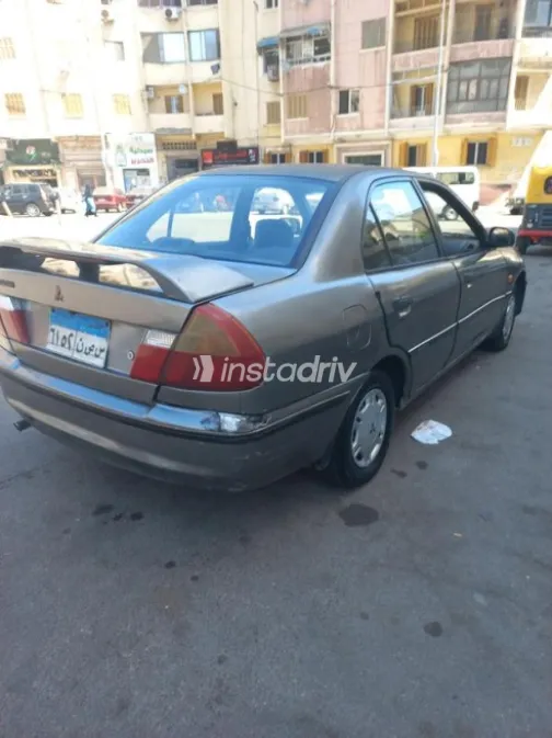 ميتسوبيشي لانسر كرستالة 1999 رمادي غامق مستعملة للبيع - 2