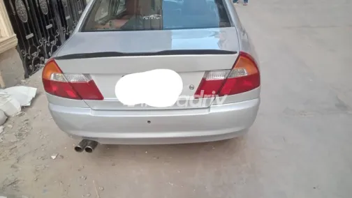 ميتسوبيشي لانسر 1998 فضي مستعملة للبيع - 2