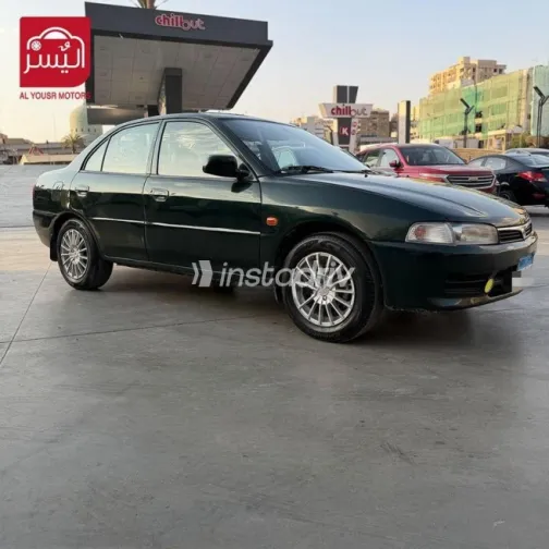 ميتسوبيشي لانسر 1998 أخضر مستعملة للبيع - 2