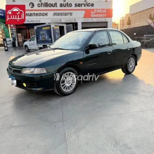 ميتسوبيشي لانسر 1998 أخضر مستعملة للبيع - 3
