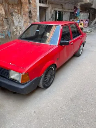 مازدا 323 1982 أحمر مستعملة للبيع