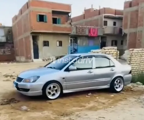 ميتسوبيشي لانسر 2006 فضي مستعملة للبيع - 3