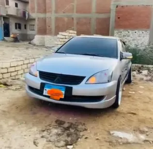 ميتسوبيشي لانسر 2006 فضي مستعملة للبيع