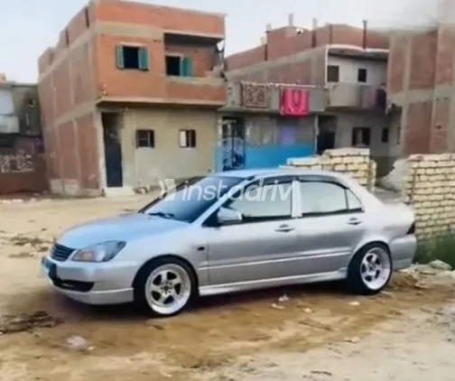 ميتسوبيشي لانسر 2006 فضي مستعملة للبيع - 3