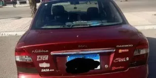 دايو نوبيرا 2004 أحمر مستعملة للبيع