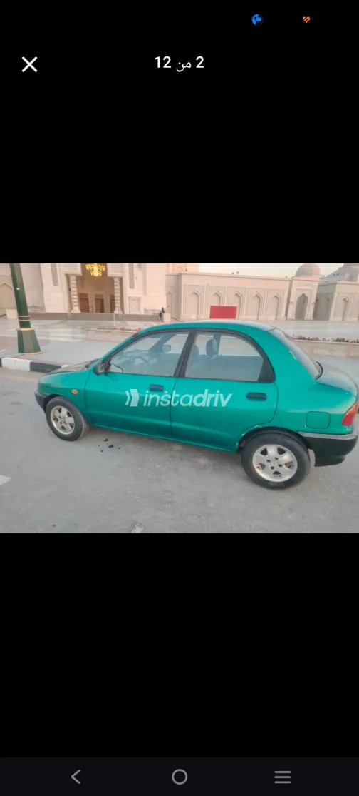 مازدا 121 1998 أخضر مستعملة للبيع - 2