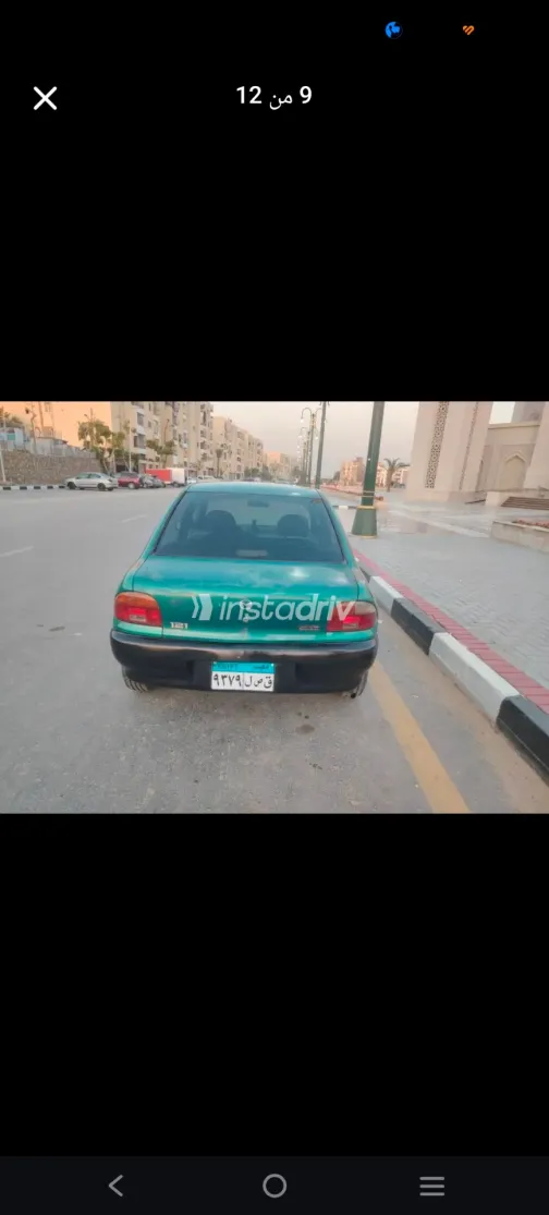 مازدا 121 1998 أخضر مستعملة للبيع - 7