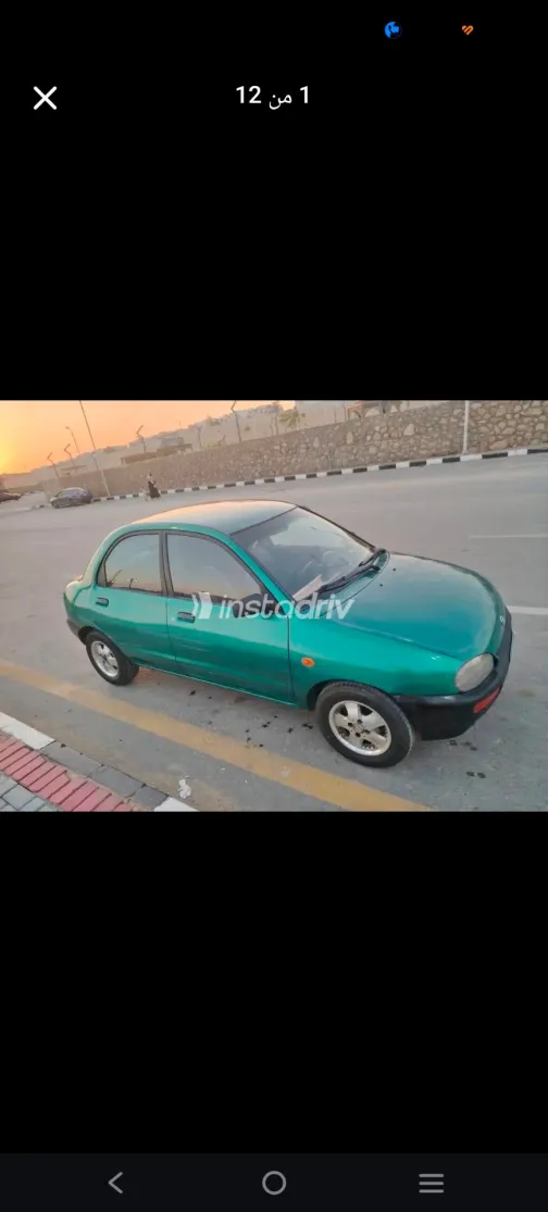 مازدا 121 1998 أخضر مستعملة للبيع - 8