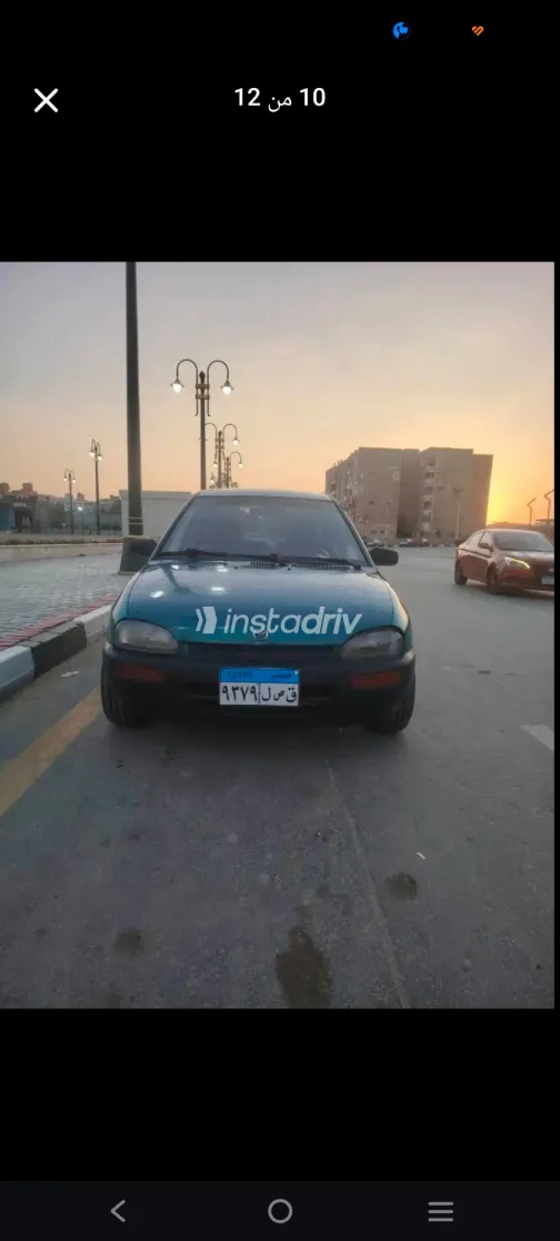 مازدا 121 1998 أخضر مستعملة للبيع - 9