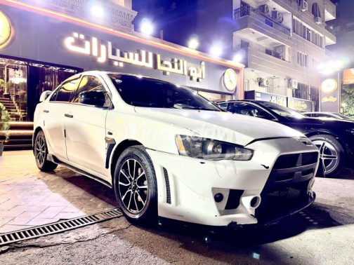 ميتسوبيشي لانسر 2016 أبيض مستعملة للبيع - 2