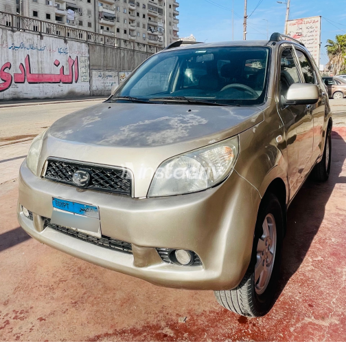 دايهاتسو جراند تريوس 2009 ذهبي مستعملة للبيع - 10