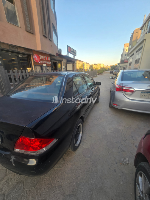 ميتسوبيشي لانسر 2007 أسود مستعملة للبيع - 2
