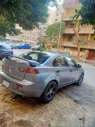 ميتسوبيشي لانسر اى اكس شارك 2016 رمادي مستعملة للبيع