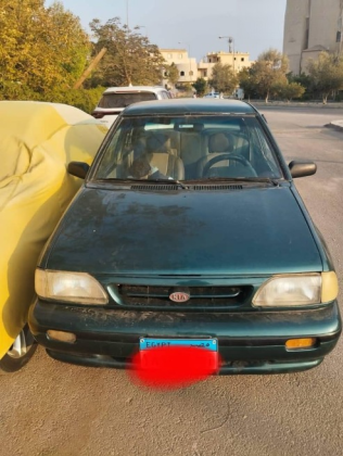كيا برايد 1999 أخضر مستعملة للبيع
