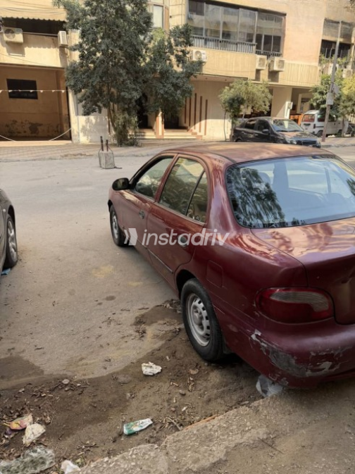 هيونداي اكسنت 2000 أحمر مستعملة للبيع - 1