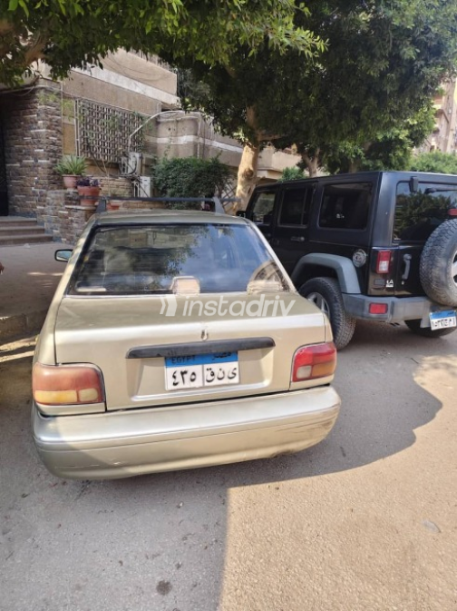 كيا برايد 2000 ذهبي مستعملة للبيع - 3