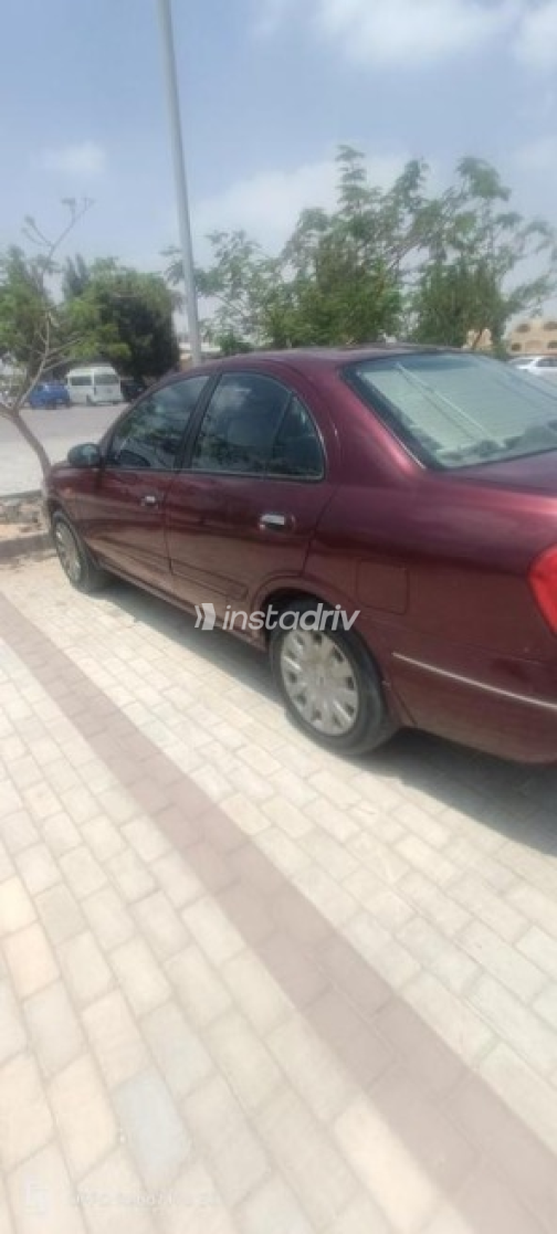 نيسان صنى 2008 أحمر غامق مستعملة للبيع - 3
