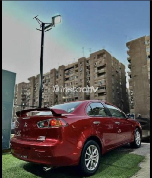 ميتسوبيشي لانسر اى اكس شارك 2018 أحمر مستعملة للبيع - 1