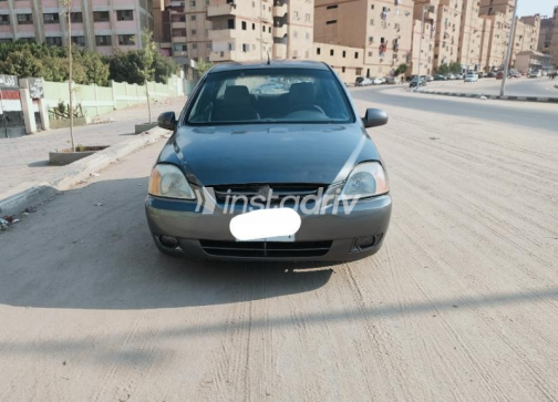 كيا ريو 2003 رمادي غامق مستعملة للبيع - 2