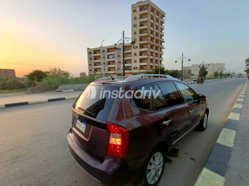 كيا كارينز 2011 بنفسجي مستعملة للبيع - 10