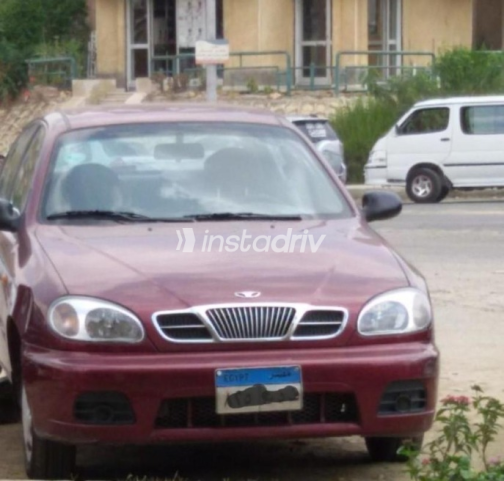 دايو لانوس 2 2000 أحمر غامق مستعملة للبيع - 1
