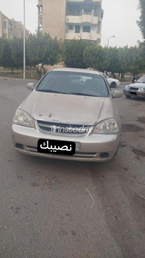 شيفروليه أوبترا 2012 برونزي مستعملة للبيع - 2