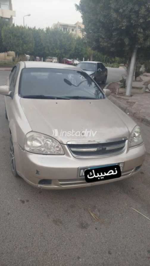 شيفروليه أوبترا 2012 برونزي مستعملة للبيع - 3