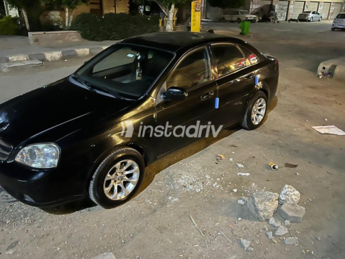 شيفروليه أوبترا 2009 أسود مستعملة للبيع - 10