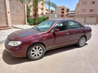 نيسان صنى 2007 أحمر غامق مستعملة للبيع