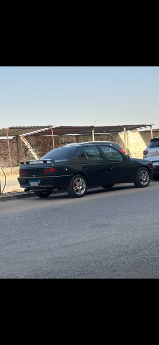 بيجو 405 1993 أخضر يدوي مستعملة للبيع في مصر الجديدة