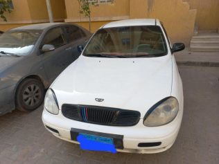 دايو ليوجانزا 2000 أبيض يدوي مستعملة للبيع في 6 أكتوبر