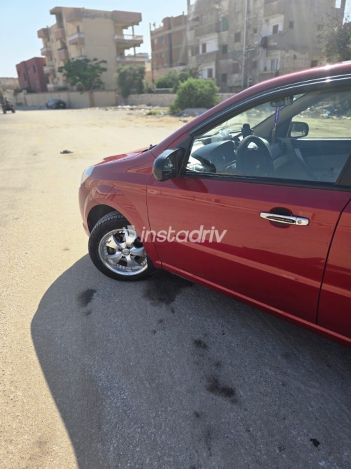 شيفروليه افيو 2019 أبيض أوتوماتيك مستعملة للبيع في الإسكندرية - 8